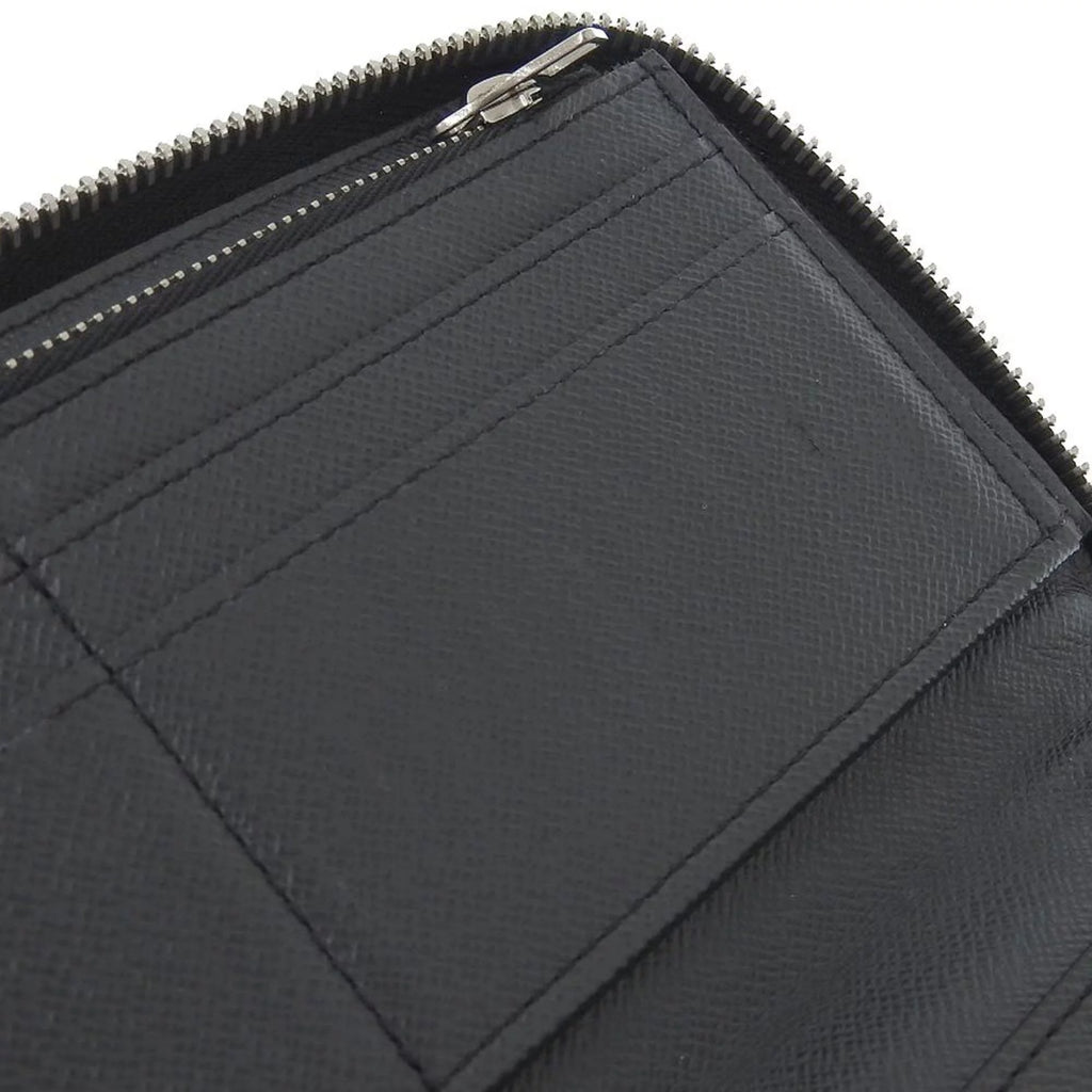 Secondhand Louis Vuitton LOUIS VUITTON Taiga Zippy Wallet Vertical Round Zipper Long Noir M30503 (Good)
