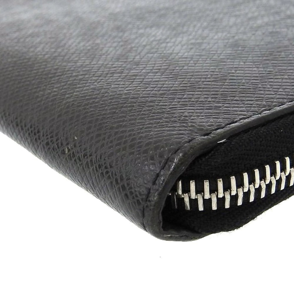 Secondhand Louis Vuitton LOUIS VUITTON Taiga Zippy Wallet Vertical Round Zipper Long Noir M30503 (Good)