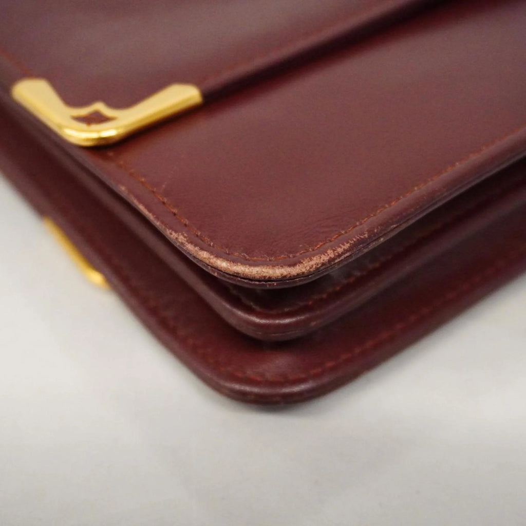 Previously Owned Cartier Shoulder Bag Must Leather Bordeaux For Her (Good)