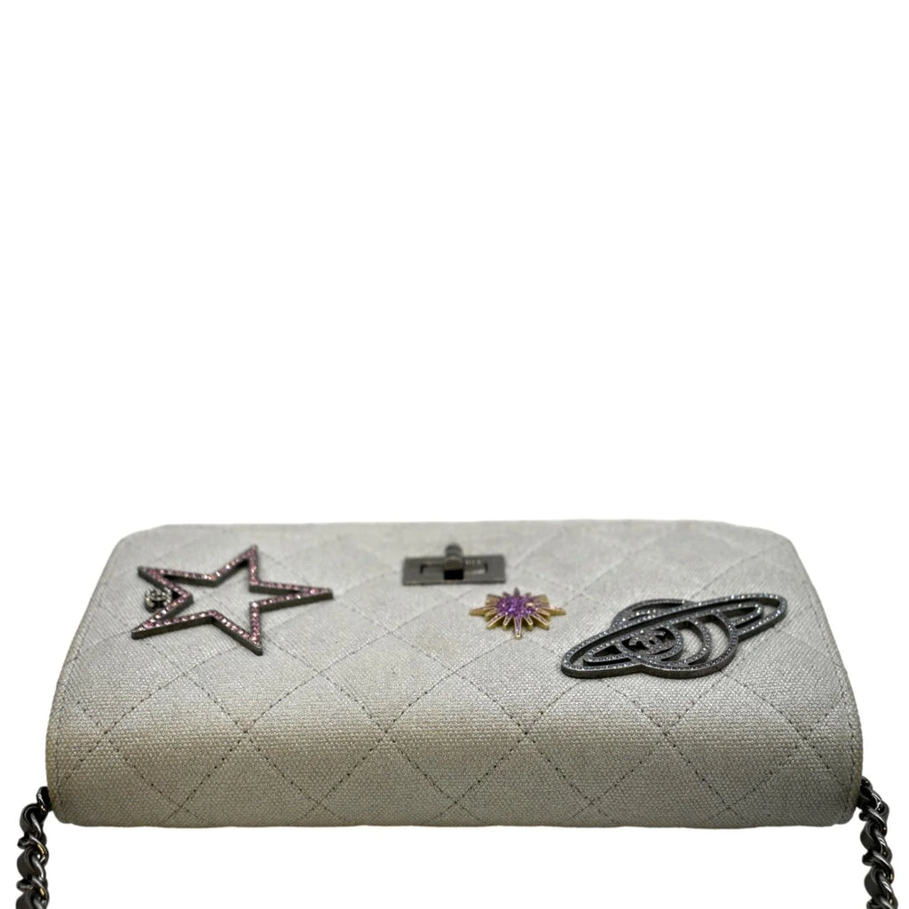 Previously Owned CHANEL Classic 2.55 Reissue Space Charm Quilted Canvas WOC Crossbody Bag Light Grey